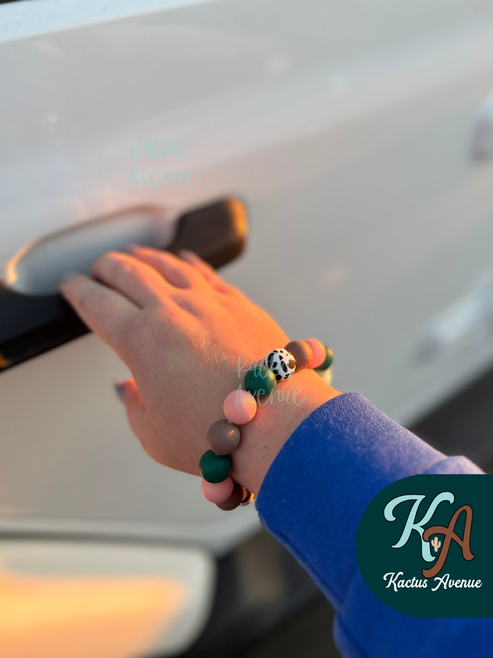 The Avenue Babe Silicone Wristlet
