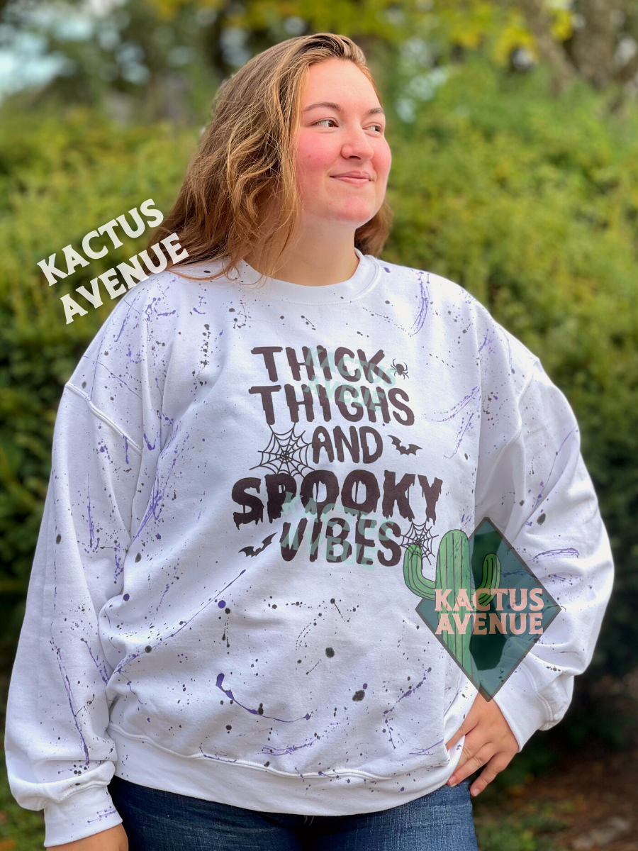 Thick Thighs + Spooky Vibes Color Splattered Sweatshirt